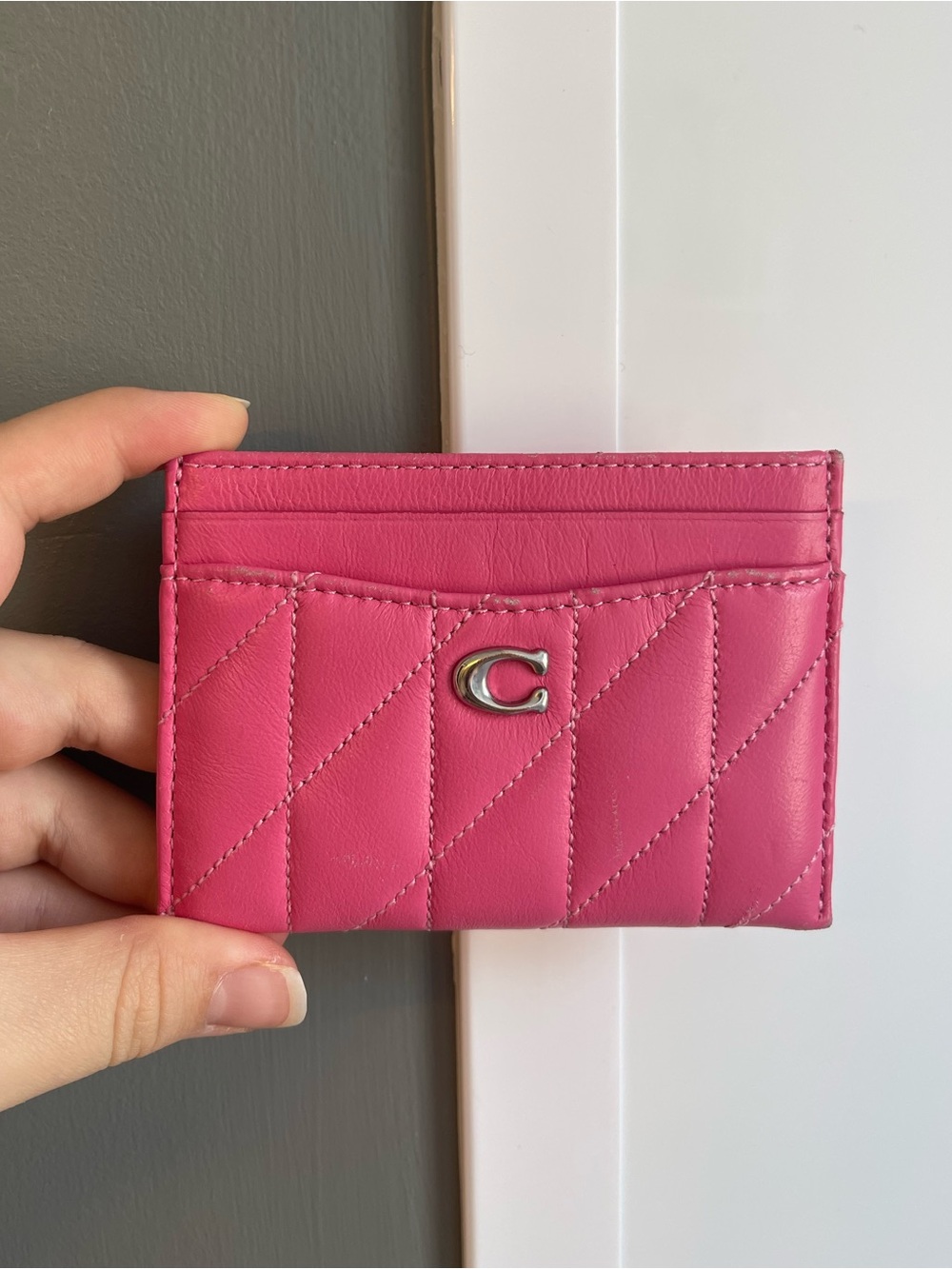 6. Coach quilted card holder
